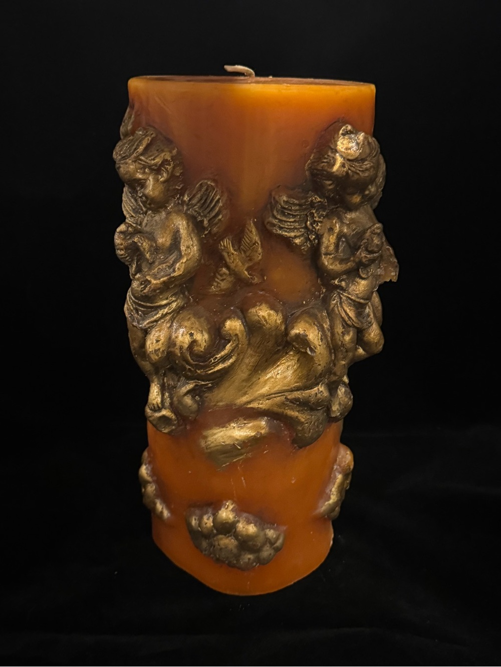 Neiman Marcus Baroque Style Amber Pillar Candle with Gold Cherub and Dove Relief